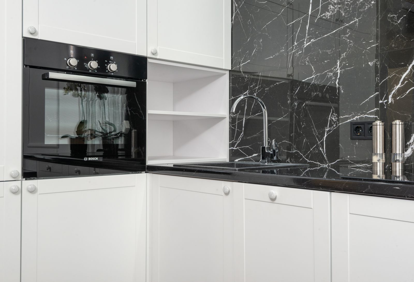 Rendered contemporary kitchen with an island and pendant lighting