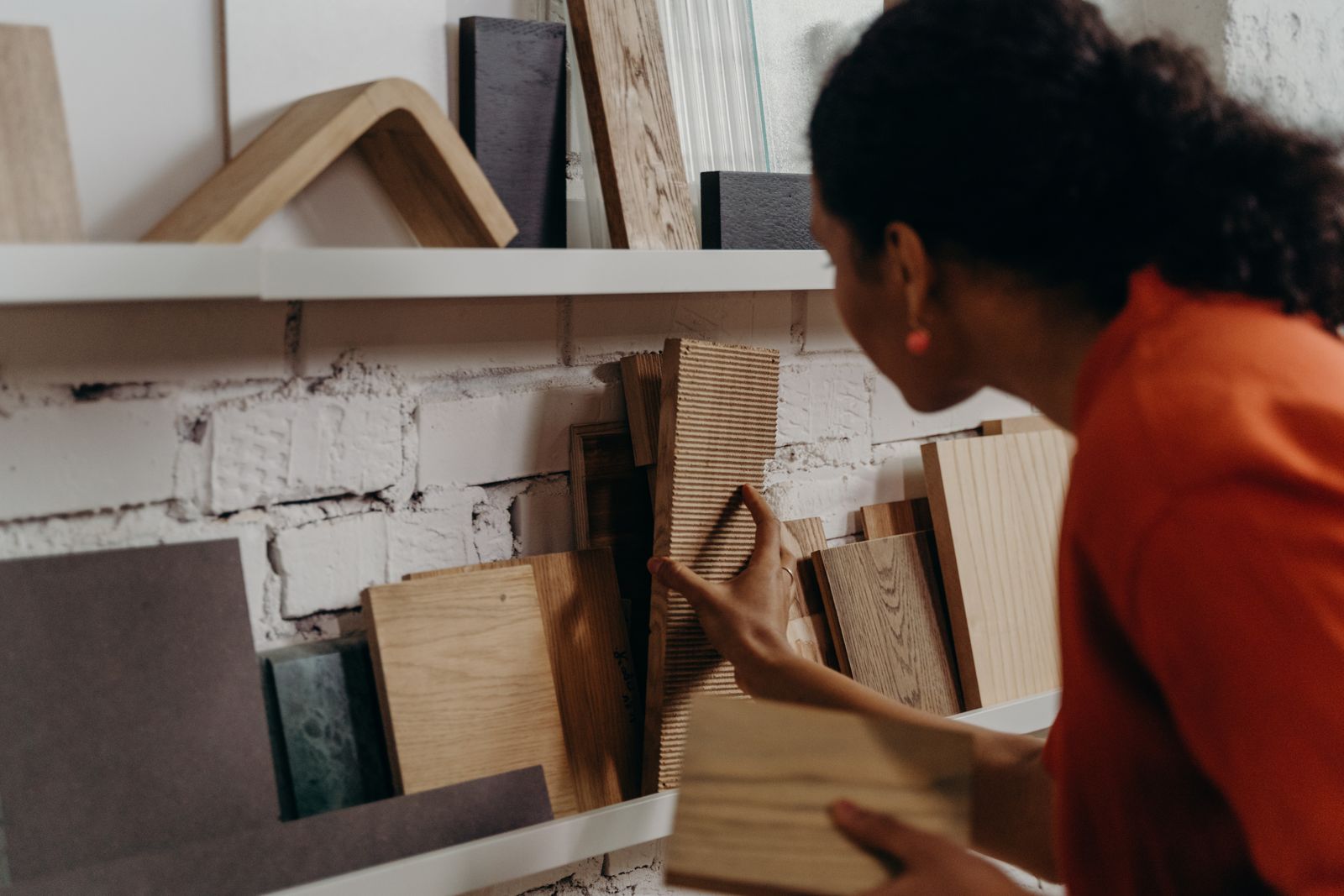Designer reviewing kitchen drawings at the Lumen studio